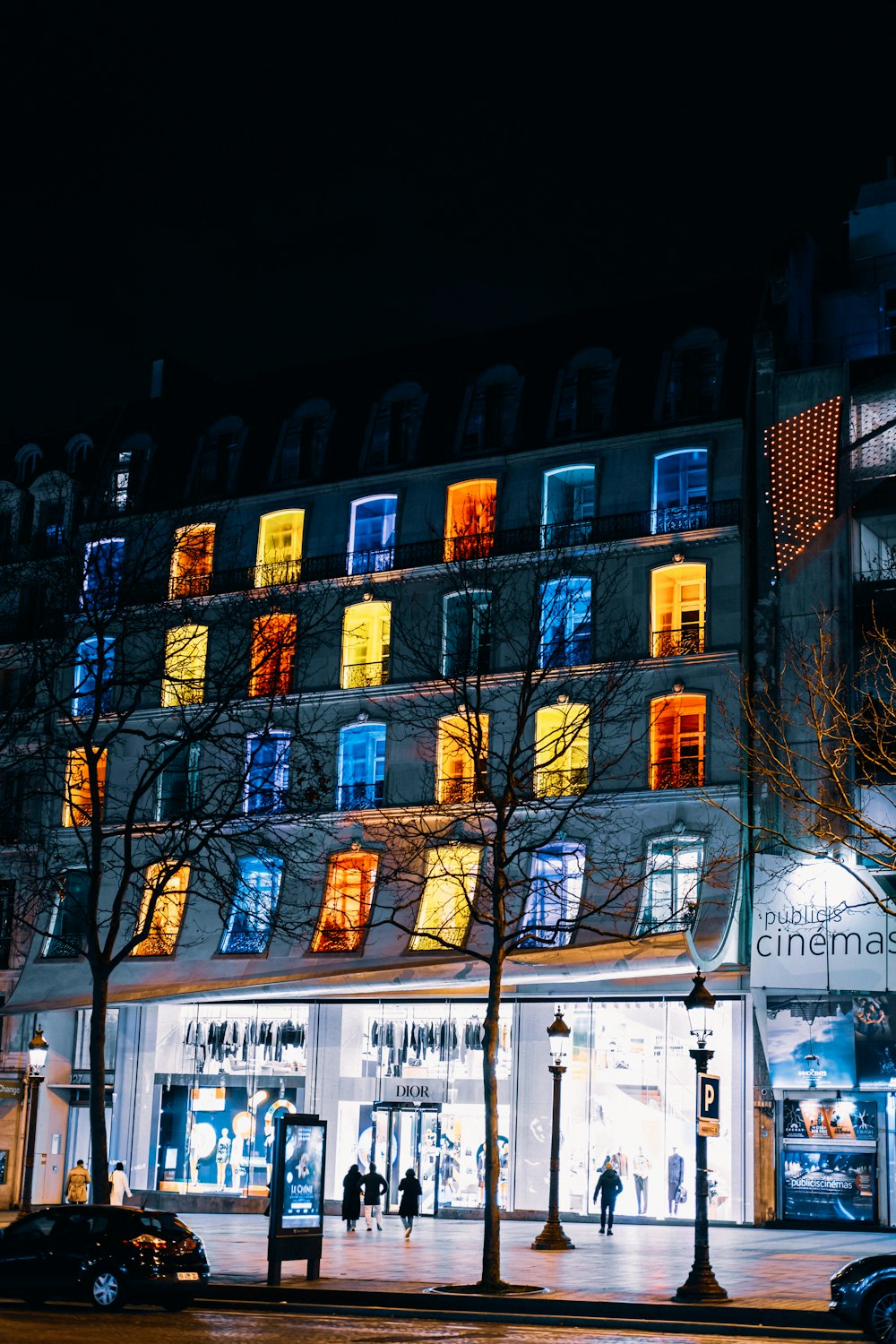 a building with many windows lit up at night