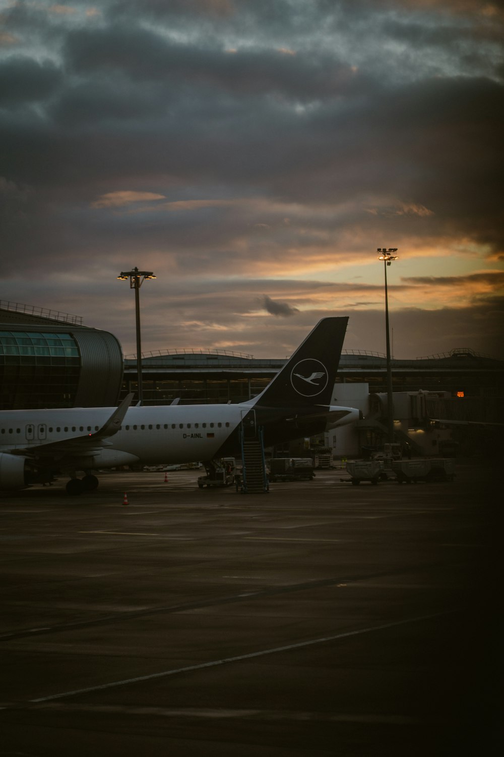 a couple of airplanes parked at an airport