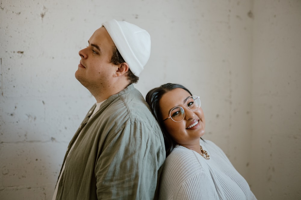 a man and a woman standing next to each other