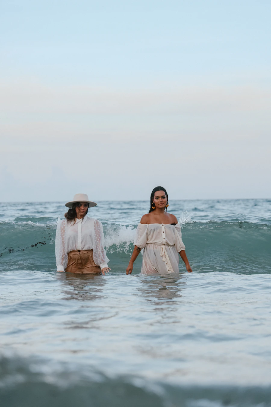 Women's group walking along the coast