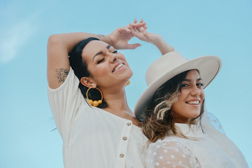 a couple of women standing next to each other