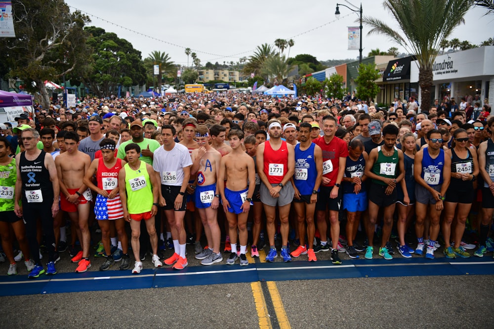 a large group of people standing next to each other