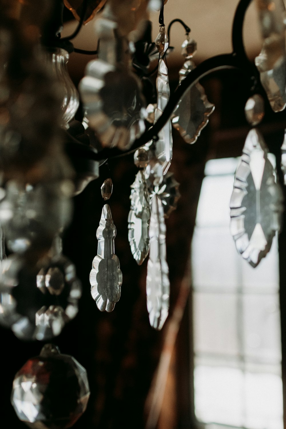 a chandelier hanging from a ceiling in a room