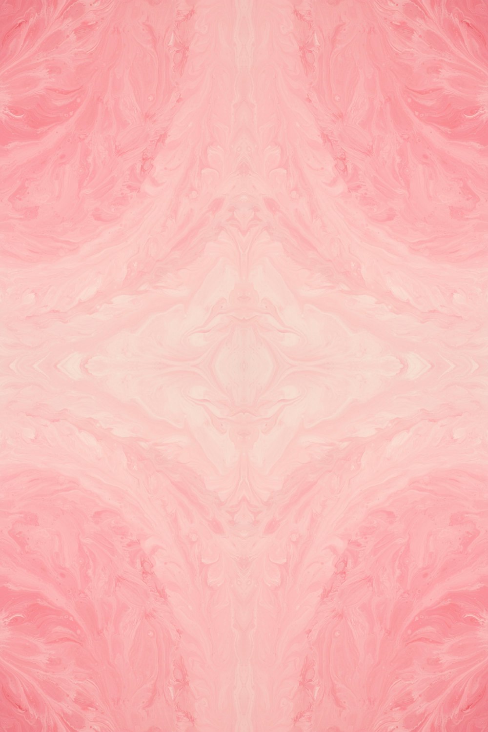 a pink and white background with a pattern