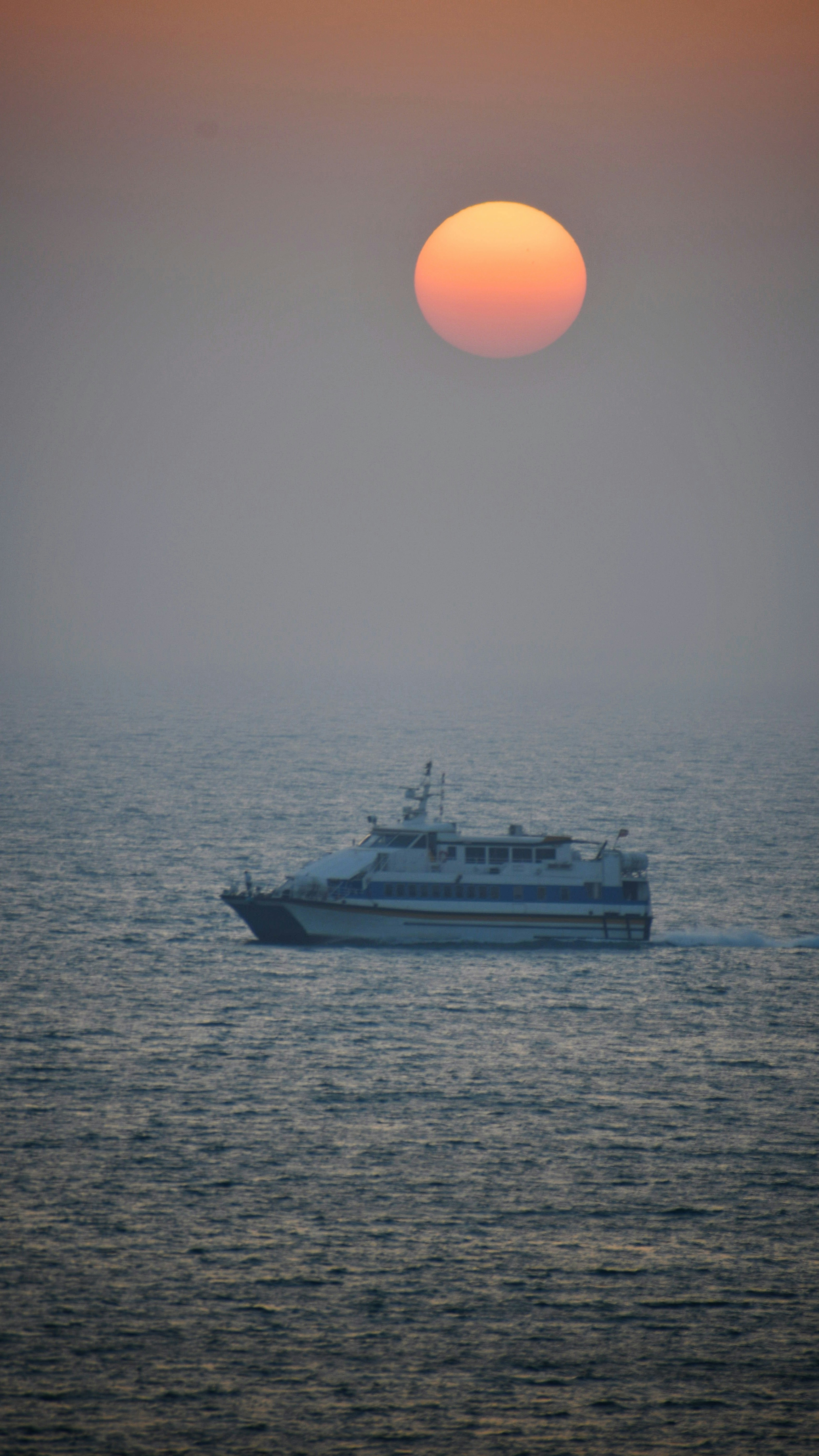 a large boat in the middle of a body of water photo – Free Boat Image ...