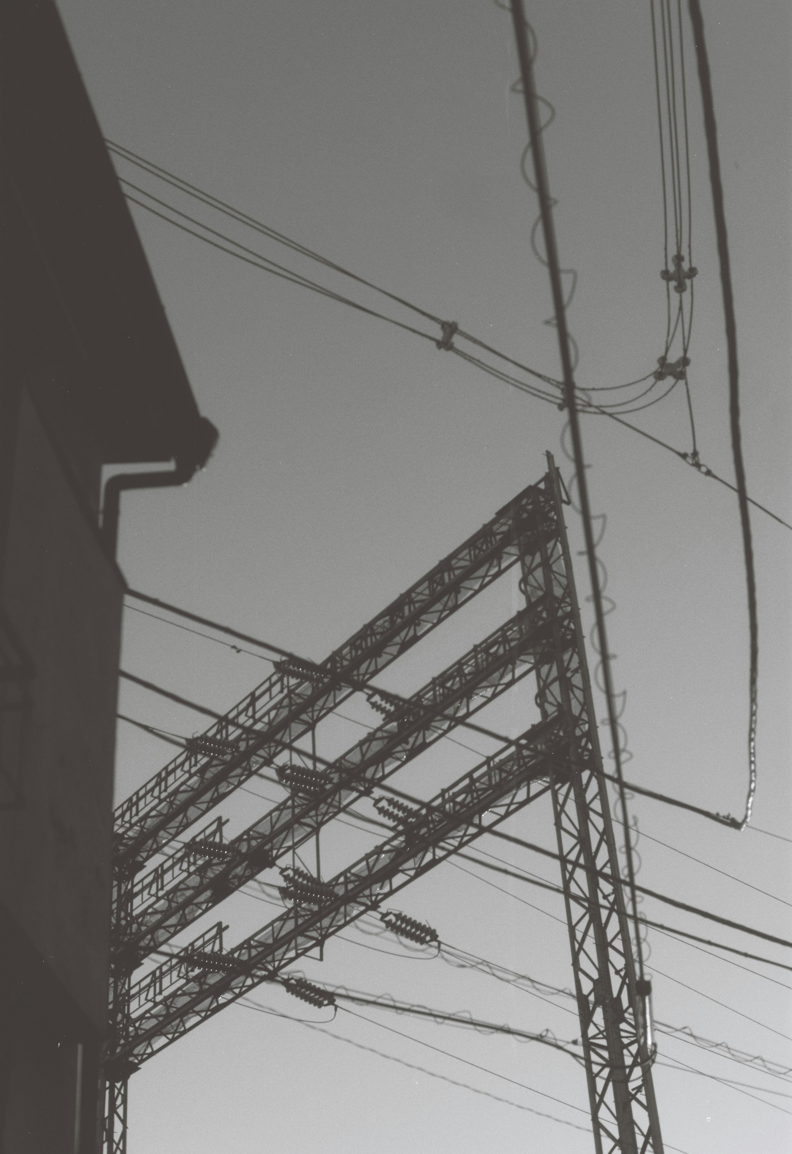 a black and white photo of power lines