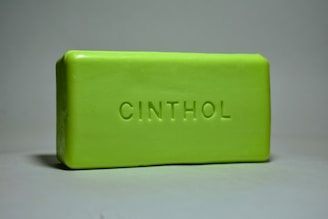 a green bar of soap with the word cinthol on it