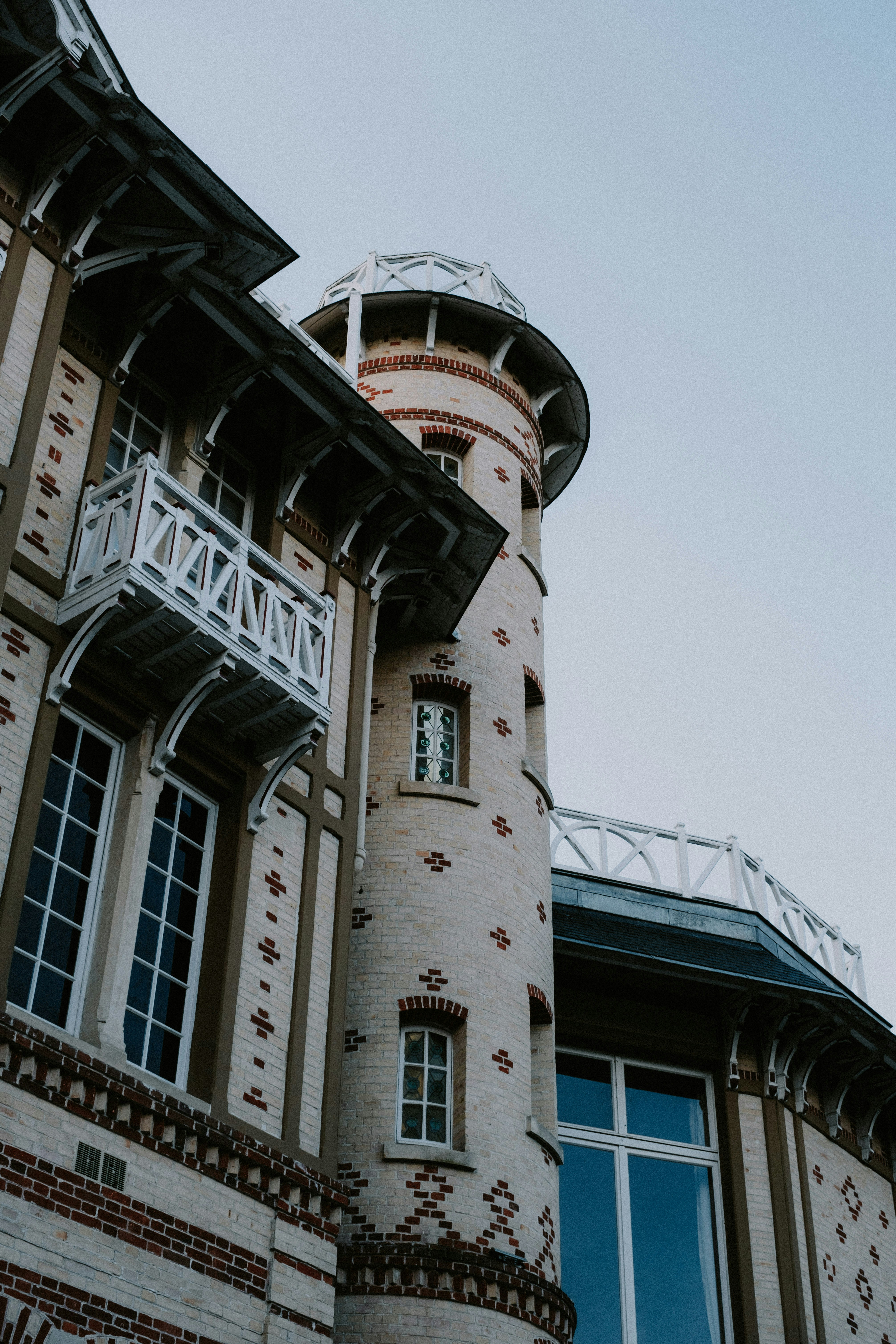 a tall building with a clock on the front of it