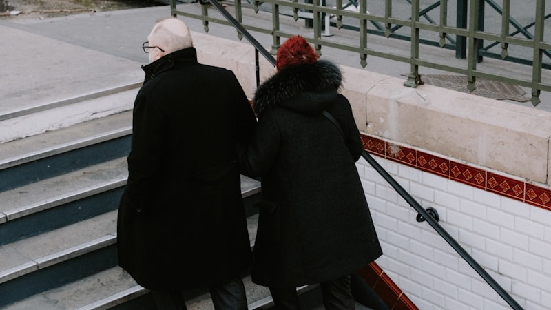 Posh couple on stairs