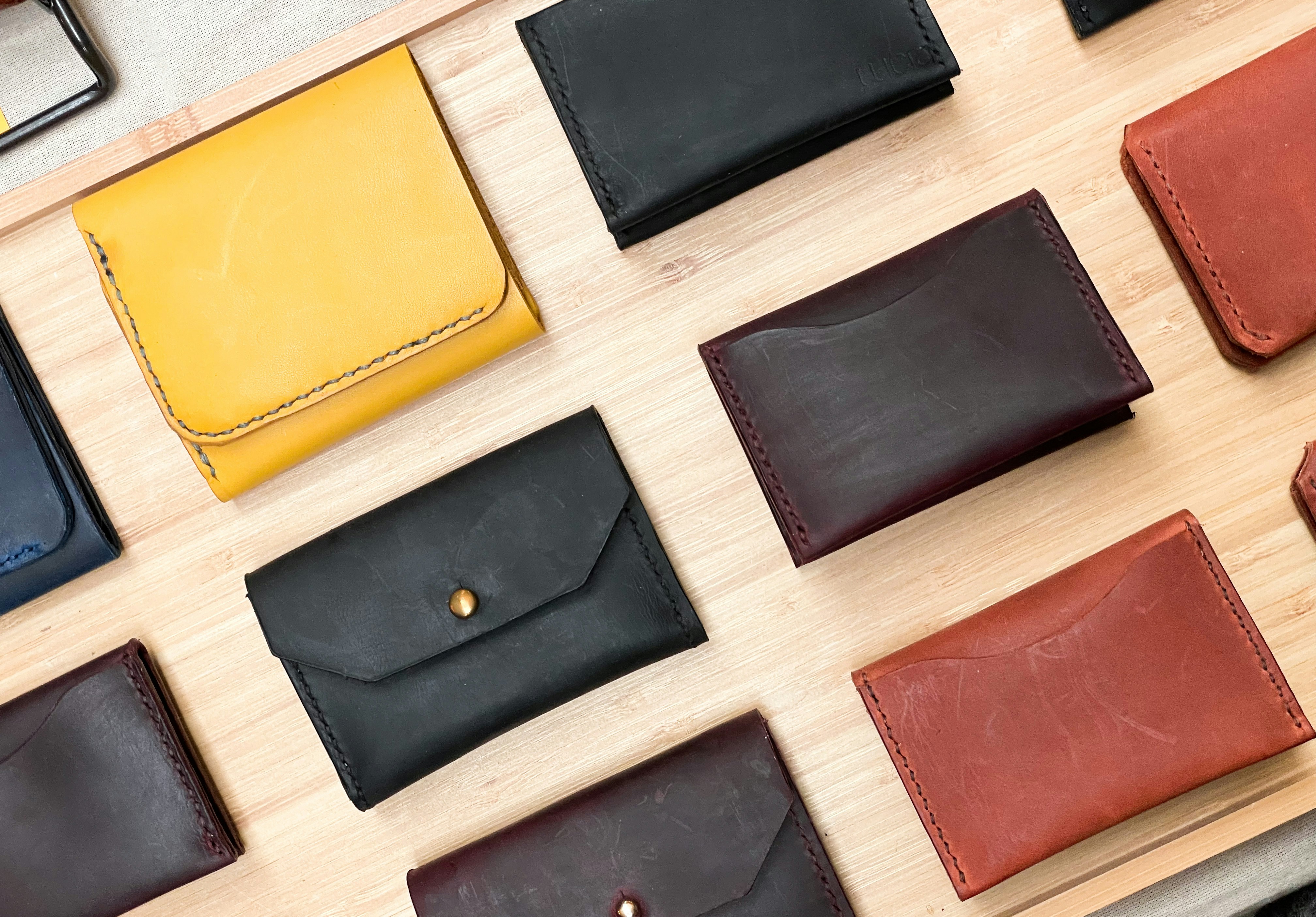 A collection of luxury leather wallets