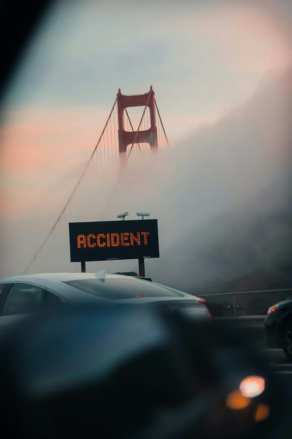 a foggy view of the golden gate bridge