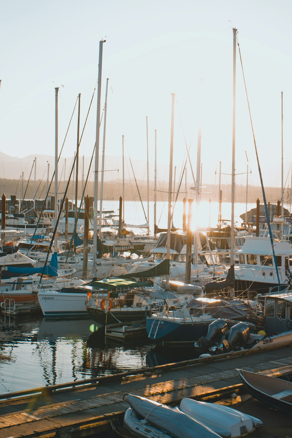 a harbor filled with lots of boats on a sunny day