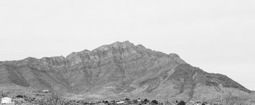 a black and white photo of a mountain range