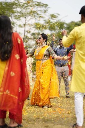 a group of people standing around each other