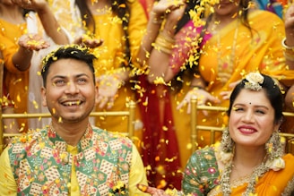 a man and a woman standing in front of a group of people