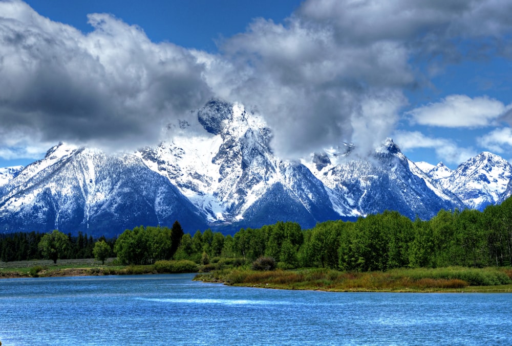 a mountain range with a lake in front of it