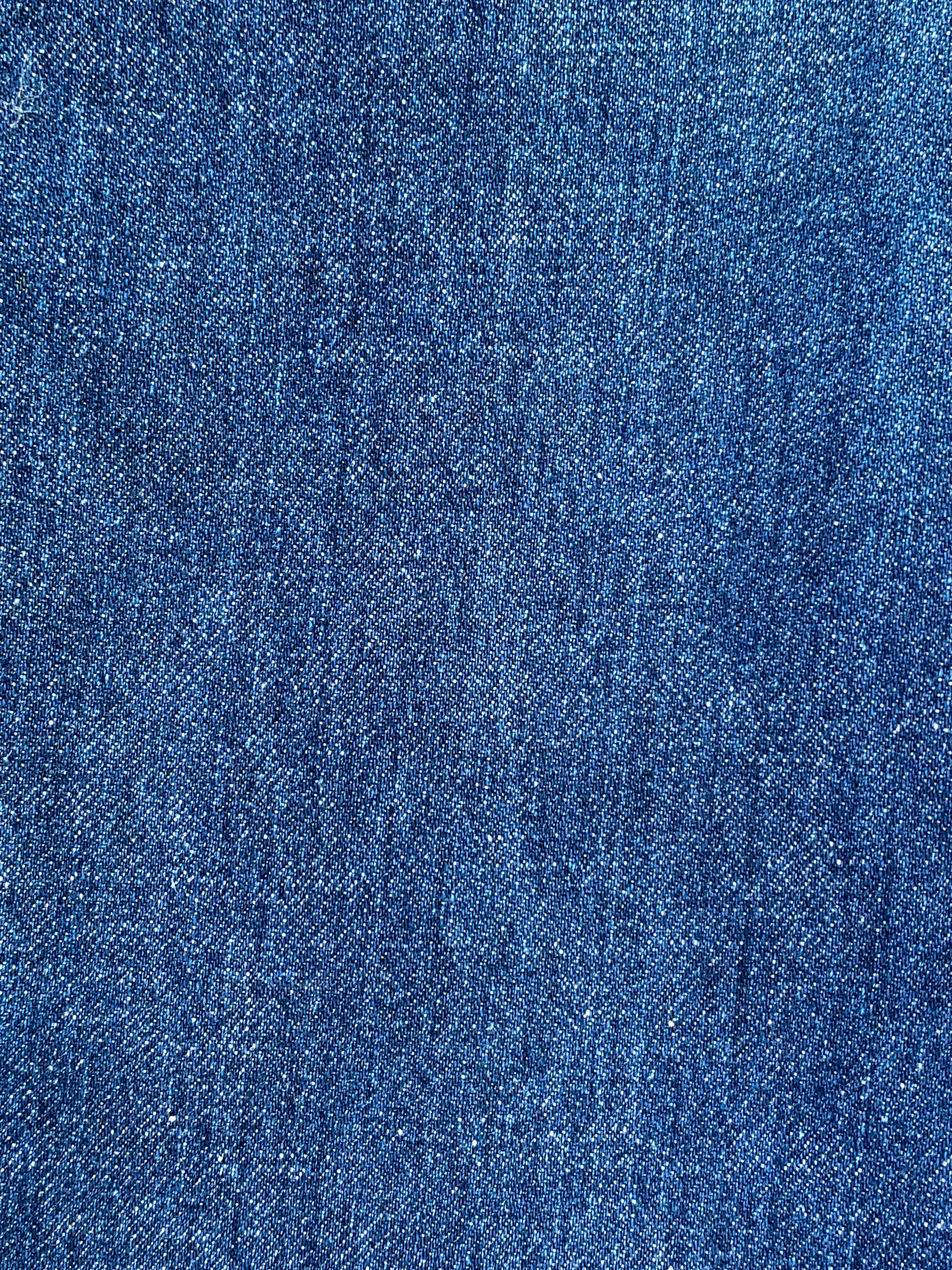 a close up of a blue jean fabric