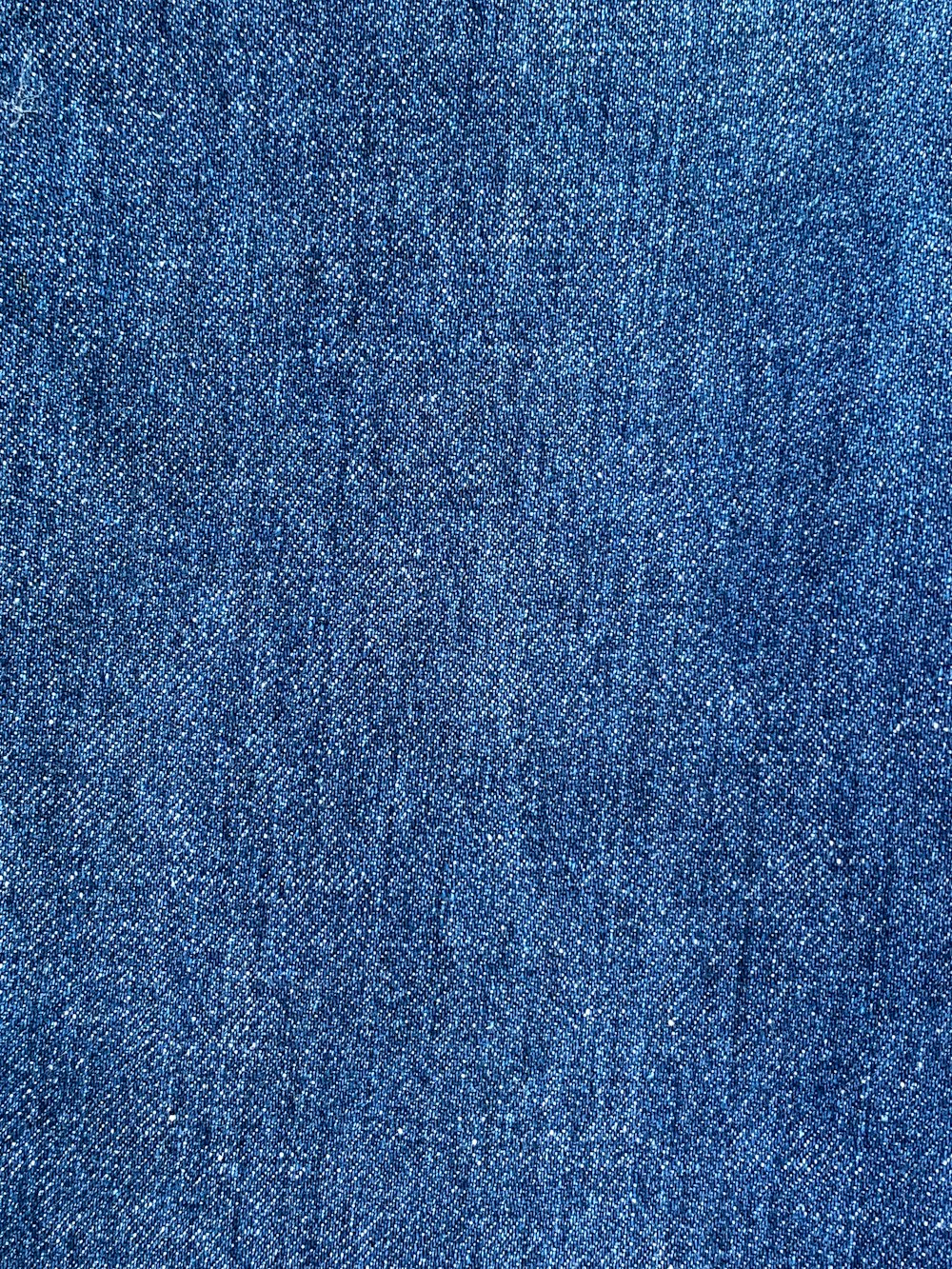 um close up de um tecido jeans azul