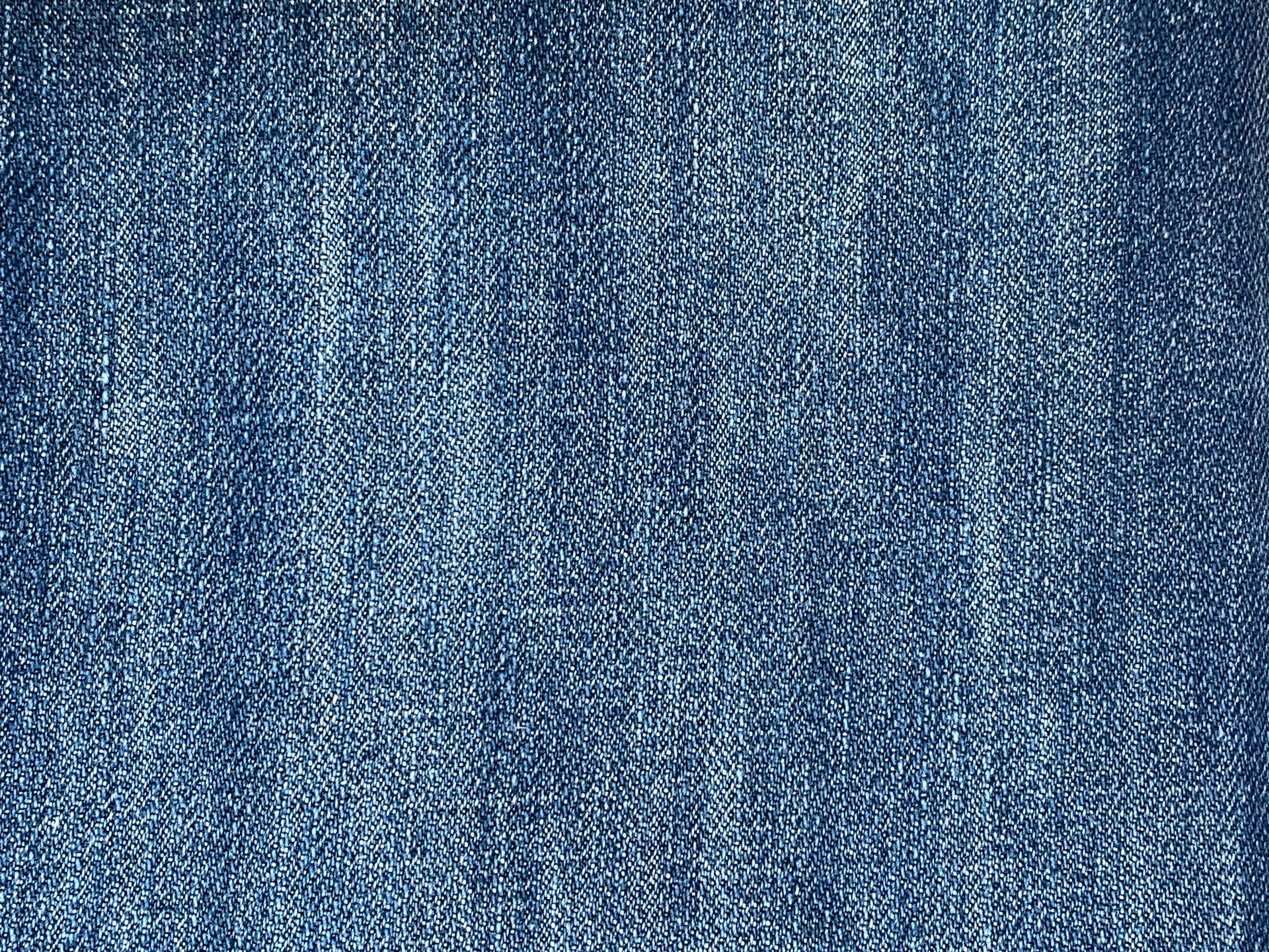 a close up of a blue jean fabric