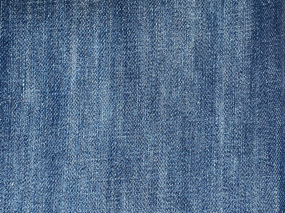 a close up of a blue jean fabric