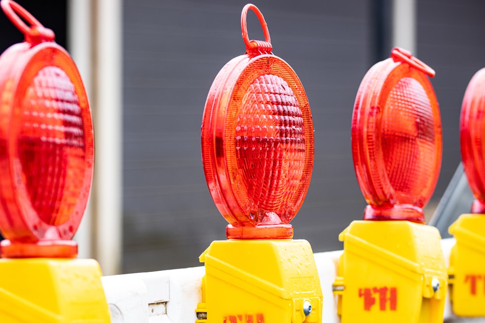 a row of red and yellow traffic lights