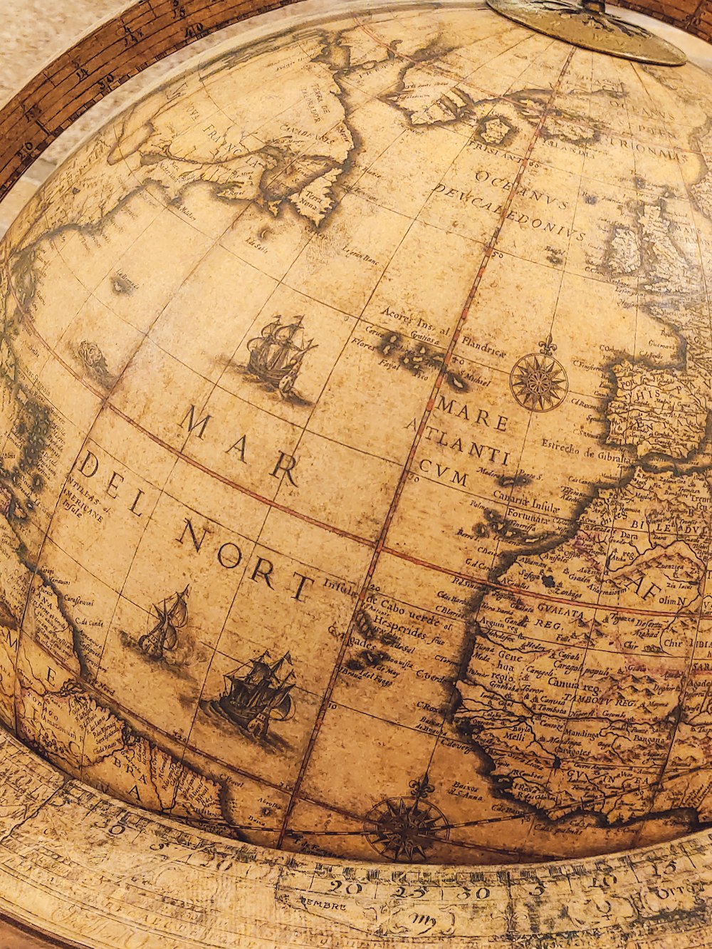 a close up of a globe on a table