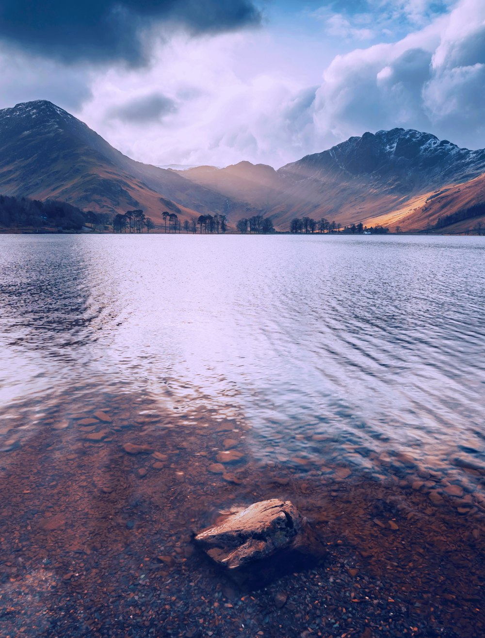 a large body of water surrounded by mountains