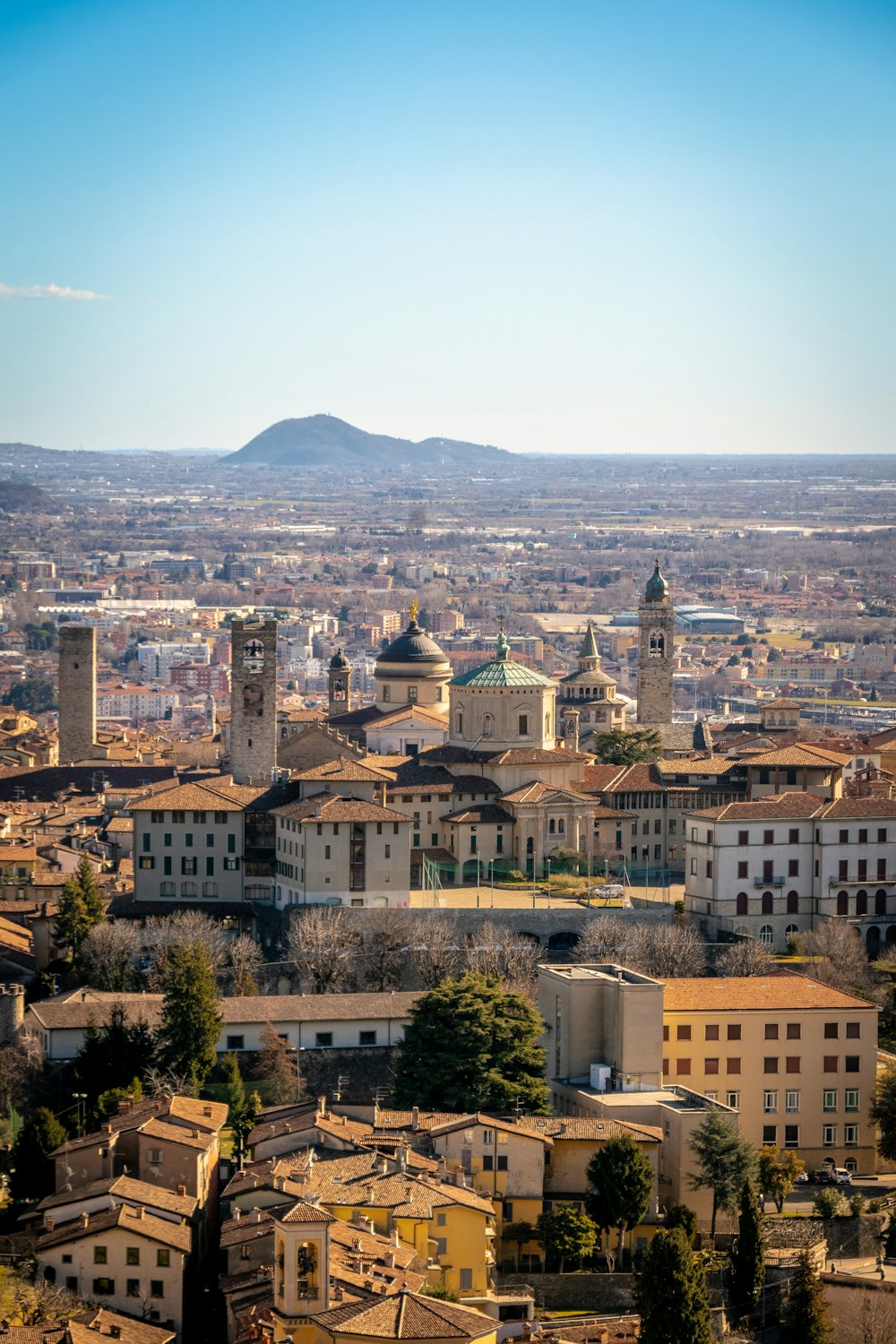 a view of a city with a mountain in the background