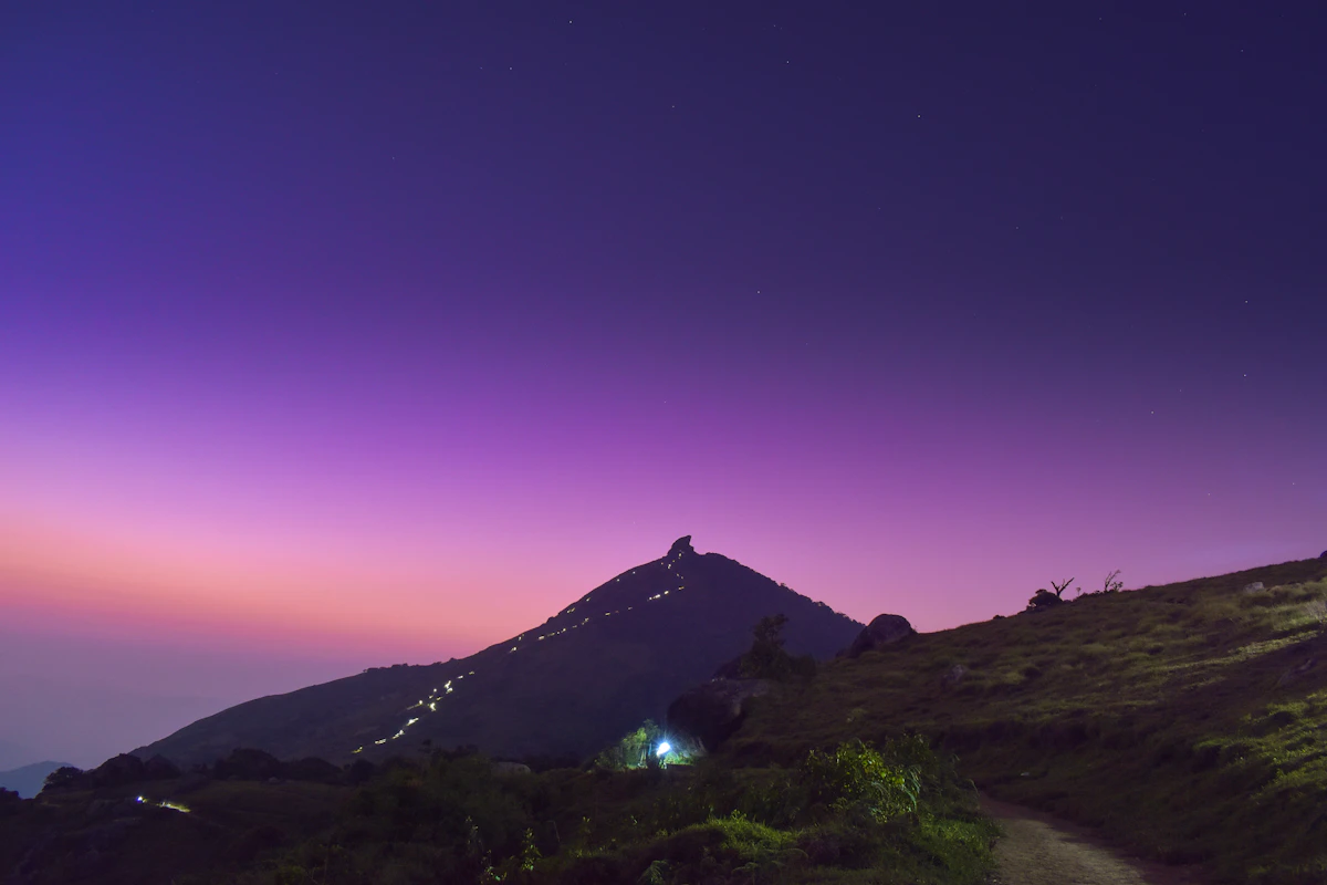 Trail climbing the slope of a hill on the Velliangiri Andavar temple trail