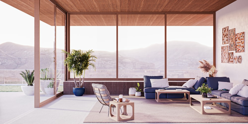 a living room filled with furniture and a large window