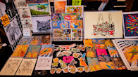 a table topped with lots of cards and pictures
