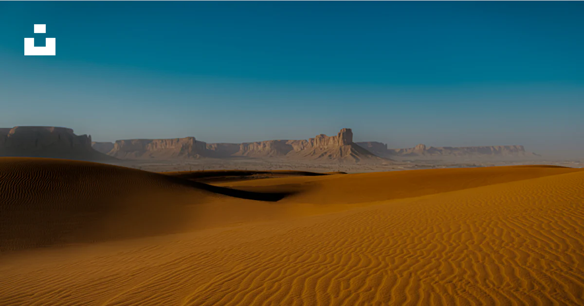 Desert Landscape Riyadh A desert landscape with sand dunes and mountains in the background ...