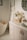 A serene bathroom setting featuring plush towels and elegant decor.