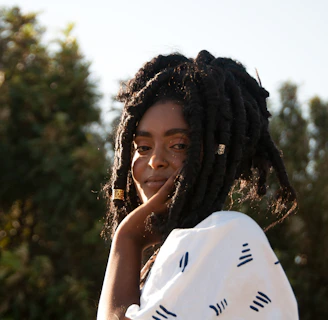 Elegant Senegalese twists cascading over shoulders in natural light