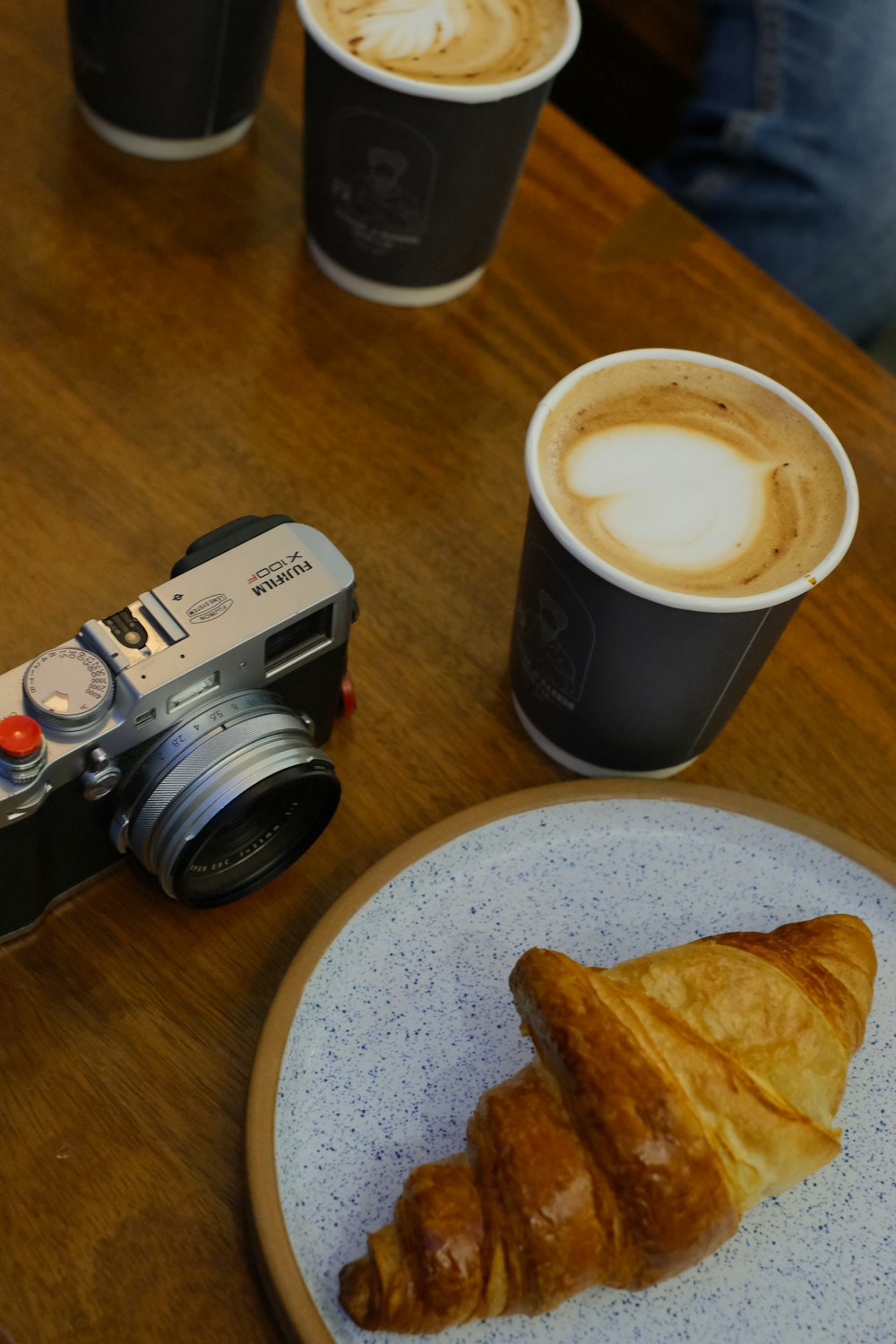 a plate of food and a cup of coffee