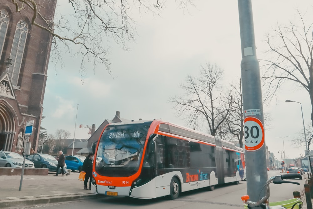 a bus is parked on the side of the road