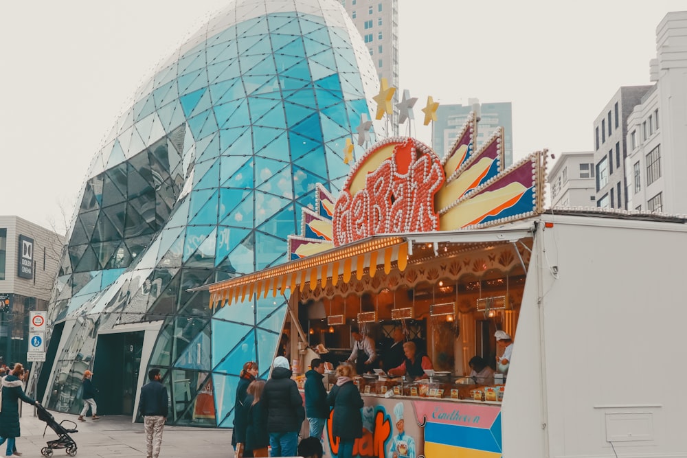 a carousel in front of a large building