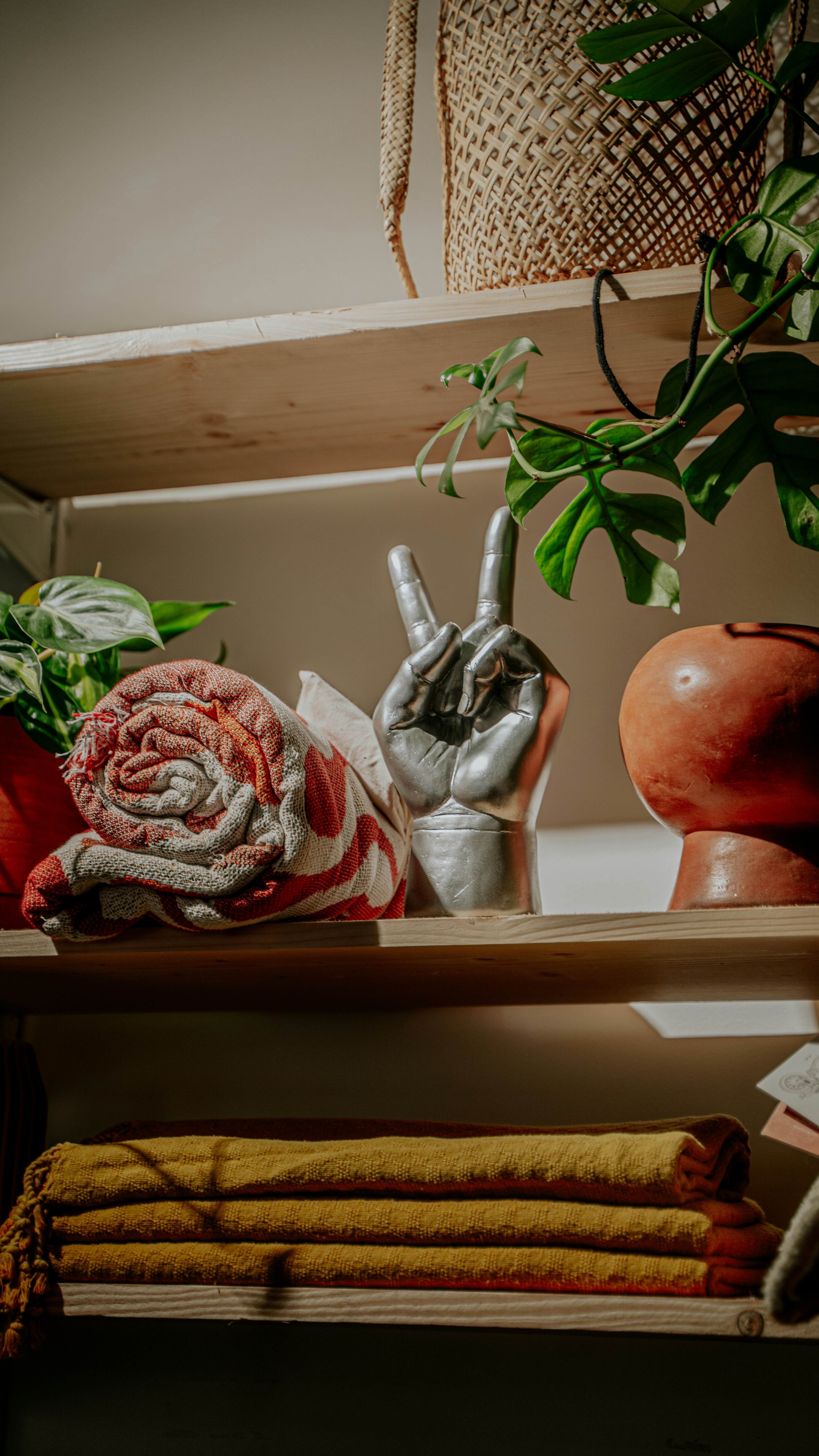 a shelf filled with lots of different types of cloths