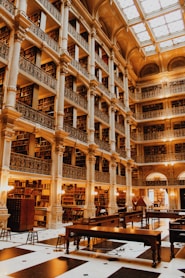 a library filled with lots of books and tables