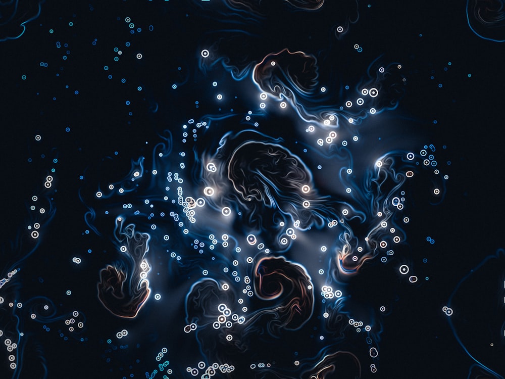 a blue and black background with bubbles and bubbles