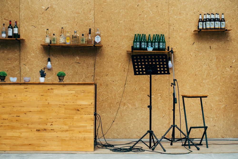 a set of microphones sitting next to a wooden counter