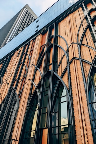 A close-up of architectural details showcasing brickwork and modern design elements on a new building.