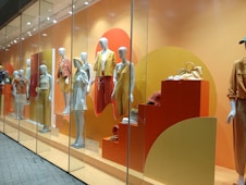 a display of mannequins in a store window