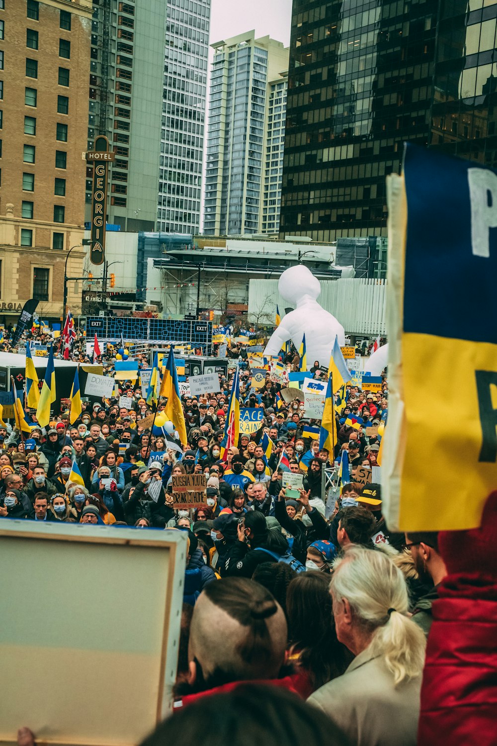 a large crowd of people in a city