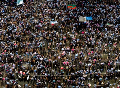 a large group of people standing in a crowd