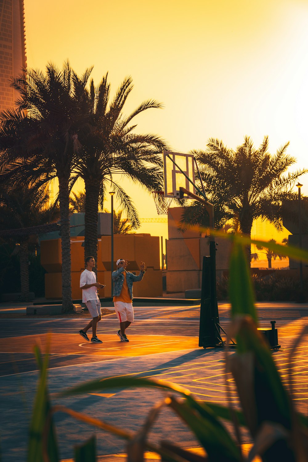 a group of people playing a game of frisbee