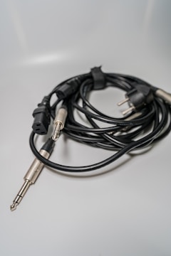 Professional audio cables and tools laid out neatly.