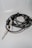 Close-up of high-quality audio cables arranged neatly on a wooden surface.