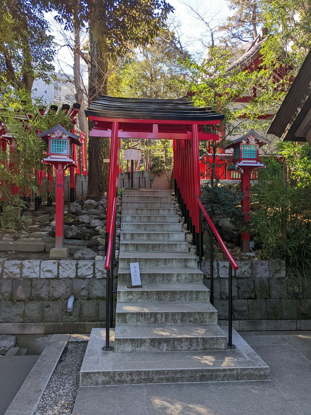 a set of stairs leading up to a shrine