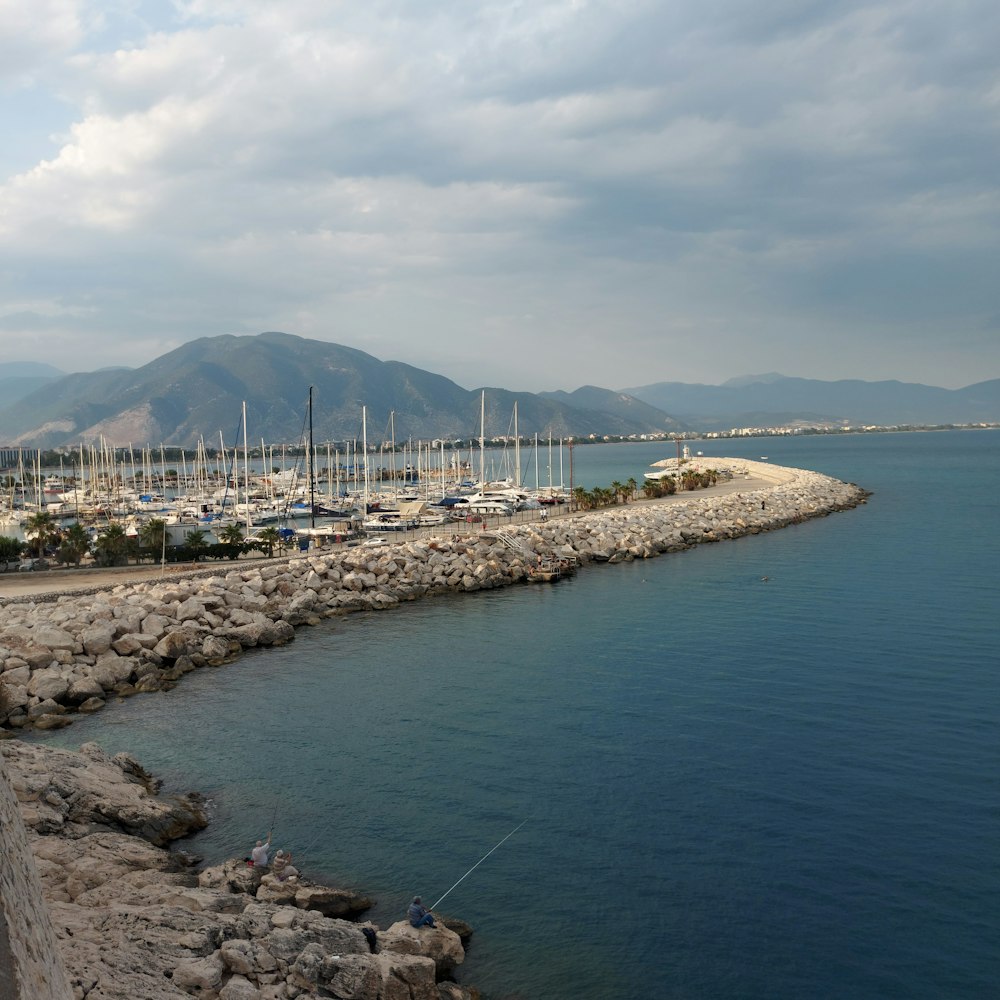 a body of water with a bunch of boats in it